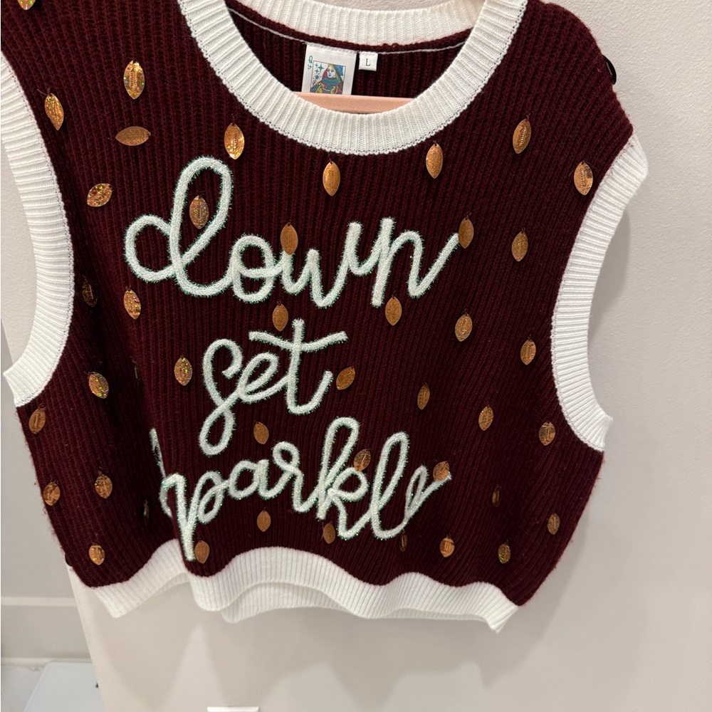QOS “Down Set Sparkle” maroon football sweater vest